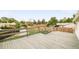 Spacious gray wood deck with views of the backyard and surrounding neighborhood at 2988 S Hannibal St, Aurora, CO 80013