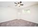 Carpeted bedroom with neutral paint, a window, and a ceiling fan at 2988 S Hannibal St, Aurora, CO 80013