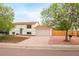 Well-maintained two-story home with white siding and a spacious two car garage at 2988 S Hannibal St, Aurora, CO 80013