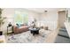 Bright and open living space with views of a large window and modern design elements at 2988 S Hannibal St, Aurora, CO 80013