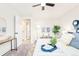 Bright bedroom with a ceiling fan and ample storage featuring modern furniture and decorations at 2988 S Hannibal St, Aurora, CO 80013