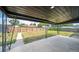 Covered patio with a spacious backyard, and a classic wood fence providing privacy at 7150 Beach St, Westminster, CO 80030