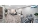 Large basement area featuring chairs and carpet flooring at 7150 Beach St, Westminster, CO 80030