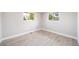 Bright bedroom features lots of natural light from the two windows at 7150 Beach St, Westminster, CO 80030