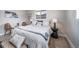 Comfortable bedroom featuring a plush bed, soft lighting, and relaxing decor at 7150 Beach St, Westminster, CO 80030