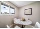 Cozy dining area featuring a marble table and modern seating at 7150 Beach St, Westminster, CO 80030
