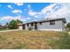 Charming single-story home features a well-maintained lawn, painted white brick, and a dark brown roof at 7150 Beach St, Westminster, CO 80030