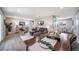 Bright and open-concept living area featuring stylish furniture, decor, and abundant natural light at 7150 Beach St, Westminster, CO 80030
