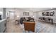 Spacious living room with wood floors, stylish furniture, and tasteful décor, perfect for entertaining at 7150 Beach St, Westminster, CO 80030