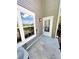 Balcony featuring exterior building finishes, and windows with door at 6731 S Ivy Way # B4, Centennial, CO 80112