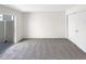 Neutral bedroom featuring sliding glass doors to a patio and double closet at 6731 S Ivy Way # B4, Centennial, CO 80112