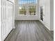 Bright living room with large windows and closet, offering ample natural light and storage at 6731 S Ivy Way # B4, Centennial, CO 80112