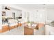 Living room with stylish furniture and open concept to dining room at 6535 Balsam St, Arvada, CO 80004