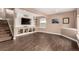 Spacious finished basement featuring hardwood floors, recessed lighting and built-in shelves at 20097 Royal Troon Dr, Monument, CO 80132