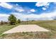 Outdoor basketball court features a well-maintained surface and hoop, perfect for recreational play in a community at 20097 Royal Troon Dr, Monument, CO 80132