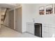 Finished basement offers bar area with wine fridge and custom cabinetry at 2409 Court Pl, Denver, CO 80205