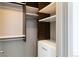 Walk-in closet features custom shelving, drawers, and ample storage space at 2409 Court Pl, Denver, CO 80205