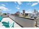 Rooftop deck highlighting seating arrangements, offering city views for outdoor entertainment at 2409 Court Pl, Denver, CO 80205