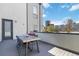 Rooftop deck featuring a wooden table and chairs, offering outdoor living space at 2409 Court Pl, Denver, CO 80205