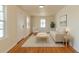 Bright, modern living room featuring hardwood floors, a neutral color palette, and ample natural light at 1945 Nome St, Aurora, CO 80010