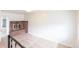 Cozy living room features brick fireplace and neutral carpet at 1945 Nome St, Aurora, CO 80010