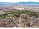 Beautiful aerial view of neighborhood near Willis Case Golf Course with mountain views at 4824 Knox Ct, Denver, CO 80221