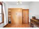 Spare bedroom featuring a Murphy bed and built in storage at 4824 Knox Ct, Denver, CO 80221