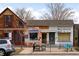 Commercial building with multiple storefronts, offering a variety of retail and service options at 4824 Knox Ct, Denver, CO 80221