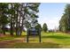 Scenic view of the Willis Case Golf Course nestled among mature trees at 4824 Knox Ct, Denver, CO 80221