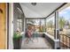 Inviting covered porch with seating, offering a relaxing outdoor space at 4824 Knox Ct, Denver, CO 80221