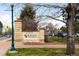 Entrance to Regis University, featuring a stone sign and well-maintained landscaping at 4824 Knox Ct, Denver, CO 80221
