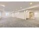 Spacious finished basement featuring plush carpet and modern recessed lighting at 24763 E Crestridge Pl, Aurora, CO 80016