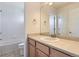 Well-lit bathroom featuring a vanity with a sink and a shower/tub combo at 24763 E Crestridge Pl, Aurora, CO 80016