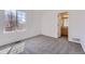 Bedroom with gray carpet, one window, and a door to the bathroom at 24763 E Crestridge Pl, Aurora, CO 80016