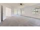 Large main bedroom boasts neutral carpet and plenty of natural light at 24763 E Crestridge Pl, Aurora, CO 80016