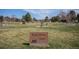 Community park featuring playground, picnic tables, green grass, and a welcome sign at 7965 Lakeshore Dr, Parker, CO 80134