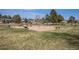 Community playground featuring swings, slides, benches, and picnic tables, perfect for Gathering fun at 7965 Lakeshore Dr, Parker, CO 80134