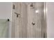 Modern bathroom featuring a tiled shower with sleek fixtures at 2310 S Decatur St, Denver, CO 80219