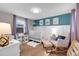 Bedroom with cute decorations and a white crib at 2310 S Decatur St, Denver, CO 80219