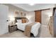 Serene bedroom with soft lighting and a decorative sliding barn door at 2310 S Decatur St, Denver, CO 80219