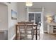 Bright dining area with table and chairs near sliding door at 2310 S Decatur St, Denver, CO 80219