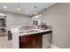 Kitchen features a breakfast bar, double sink, and modern appliances at 2310 S Decatur St, Denver, CO 80219