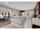 Open-concept space connecting the kitchen to a comfortable living area at 2310 S Decatur St, Denver, CO 80219
