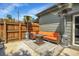 Cozy patio with seating area, fire pit, and outdoor heaters at 2310 S Decatur St, Denver, CO 80219