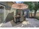 Outdoor patio with table, chairs, and umbrella at 2310 S Decatur St, Denver, CO 80219