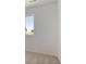 Bright bedroom featuring a window with exterior views, ample natural light, and a neutral color palette at 681 N Tempe St, Aurora, CO 80018