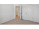 Bright bedroom with neutral carpet and white doors offers a serene and inviting space at 681 N Tempe St, Aurora, CO 80018
