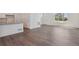 Spacious living area with modern flooring, white walls, and abundant natural light at 681 N Tempe St, Aurora, CO 80018
