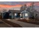 Charming home exterior with well-maintained landscaping and inviting curb appeal at sunset at 4280 S Pearl St, Englewood, CO 80113