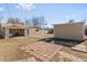 Backyard features brick patio area and detached two car garage at 1185 Worchester St, Aurora, CO 80011